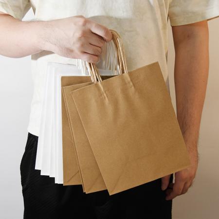 Professional custom pure color brown paper bag shopping bag